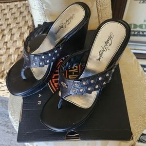 Women's Harley-Davidson Black wedge sandals with silver embellishments size 7.